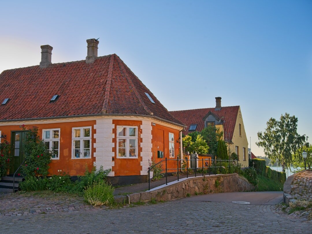 photographer walking in danish village