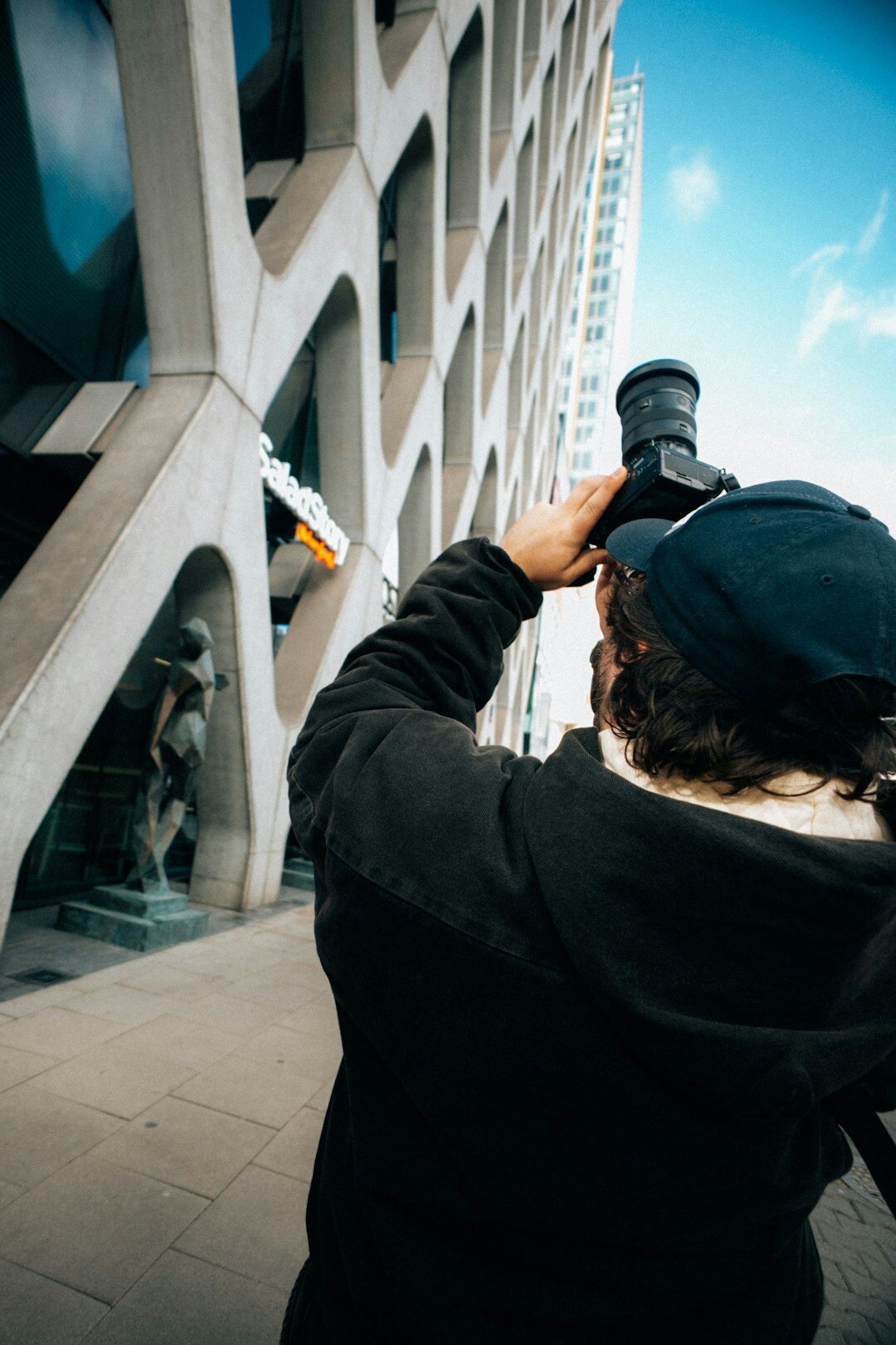 photographer capturing street moments